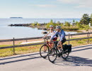 Friends cycling on Vänerleden