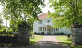 Historic hostel in a scenic setting.