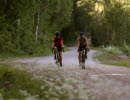 Cyclists on a dirt road,