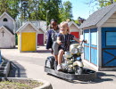 kid playing at a miniature city