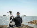 A man and a dog at Yttre Bodande.