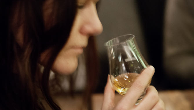 Women tasting wine. 