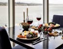 Set table with Christmas food.