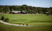 Cyclists on a dirt road,