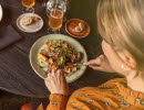 Woman eating a dish