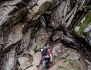 Man with backpack visiting caves