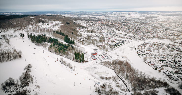 Family in wintry landscape.