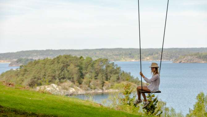 Women on a swing.