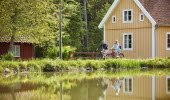 Friends cycling at Vänerleden