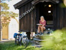 A woman sitting with a book.