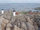 Aerial photo of the island Ursholmen with two lighthouses.