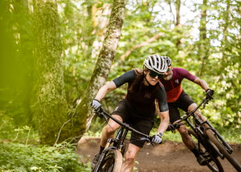 Group of people cycling MTB in Billingen.