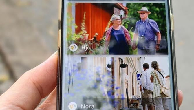 Hand som håller mobiltelefon