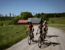 Cyclists on a dirt road,