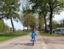 Child on balance bike