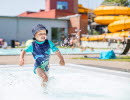 Kid playing in the pool