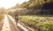 Woman on cycling holiday in West Sweden.