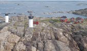 Aerial photo of the island Ursholmen with two lighthouses.