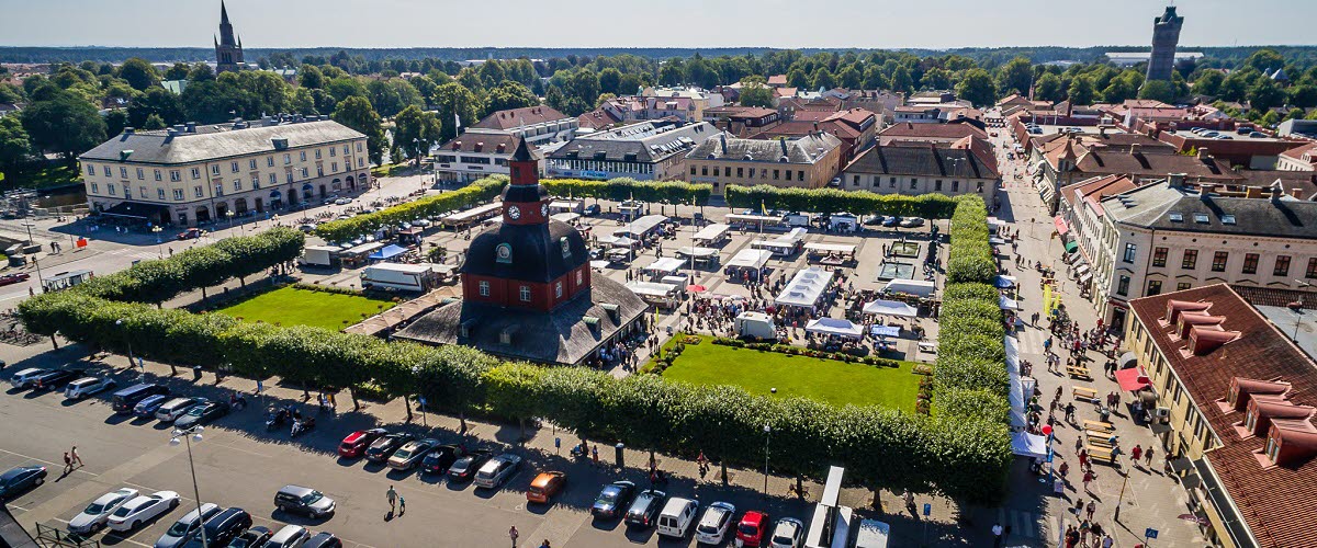 Aerial view over Rådhuset and the square a sunny day. There's a market going on.