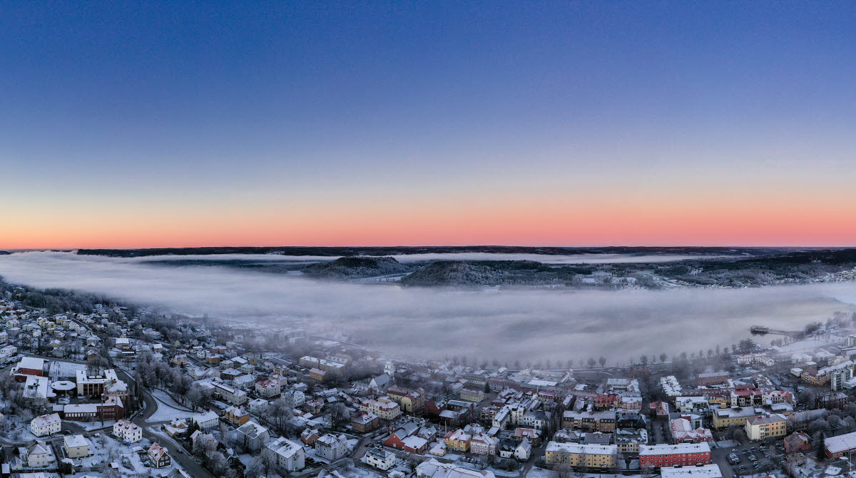 Winter view of Ulricehamn when the sun is going up.