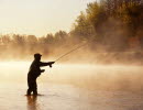 Photo of a man fishing.