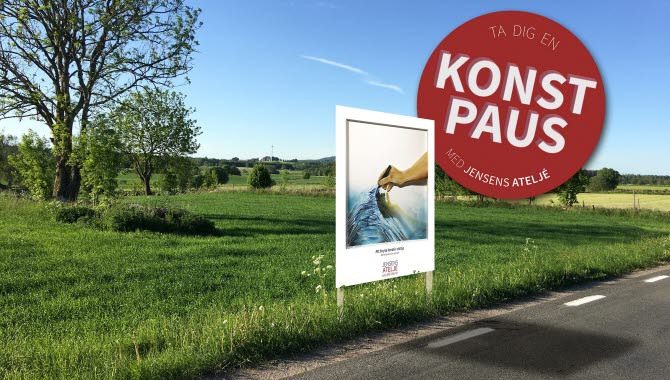 en tavla utmed en väg och en röd cirkel där det står kosntpaus.