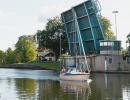 Boat travelling the Trollhätte Canal.